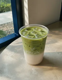 Iced coconut matcha in the Virgin cup, layered green matcha over white coconut milk.
